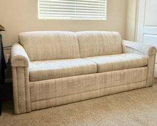 White pull out sofa