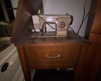 White FutureMatic Sewing Machine in Wooden Cabinet