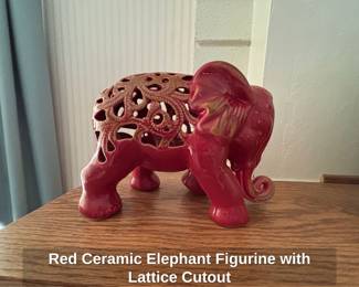 Red Ceramic Elephant Figurine with Lattice Cutout