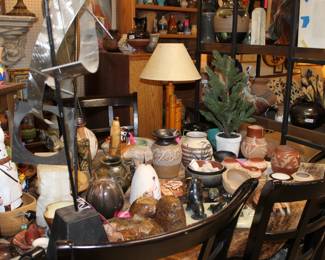 nice table and chair set with more pottery