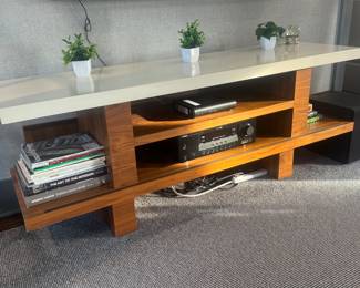 TV console to house electronics. 