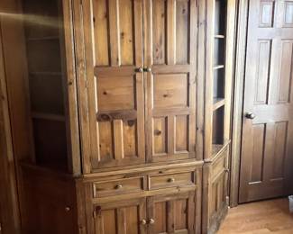 Bar cabinet lighted with side shelves