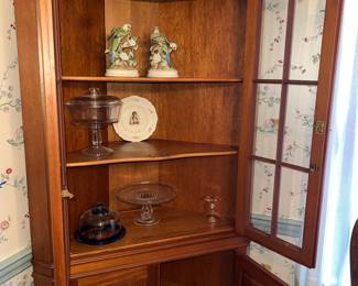 Inside of corner cabinet mahogany made by Craftique