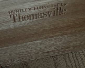 Inside drawer of side table, also matching dresser and chest if drawers