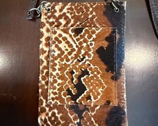Small cow high phone purse.