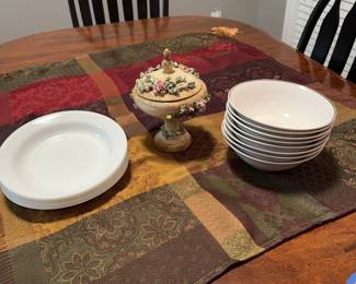 Everyday service.
7 Corelle pasta bowls, 8 Royal Norfolk cereal bowls.&nbsp;
Intricate pottery candy dish.&nbsp;
Table cover with corner tassels.