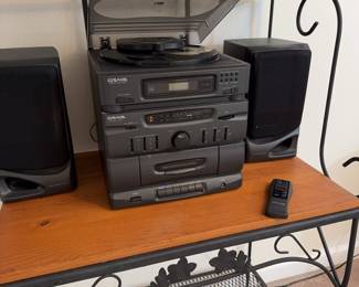 3-CD changer plus cassette player stereo with 2 speakers. Vintage electronic and works like a charm so you can finally use all the CDs and tapes in your house!