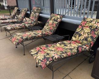 5 wrought iron chaise loungers for pool/deck area. Rear wheel drive. Cushions and 4 side tables included.