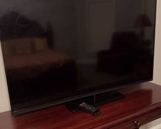 49 inch Vizio flatscreen smart TV with remote. (Stand table is separate lot).