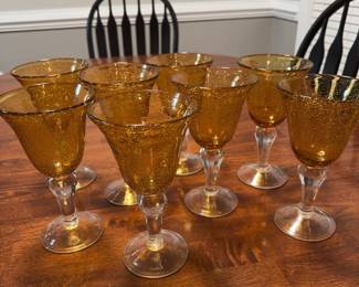 Set of eight heavy yellow goblet with bubble glass, yellow bowl on clear stem