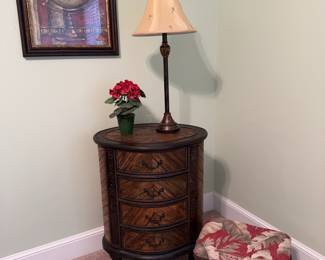 Bedroom decor, small oval 4-drawer dresser, lamp, footstool, framed globe art.