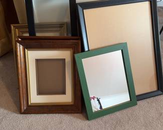 Assorted frames and a couple of mirrors.