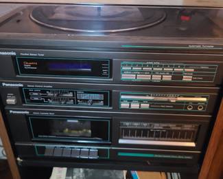 Panasonic stereo system cabinet w/ record player and vinyls