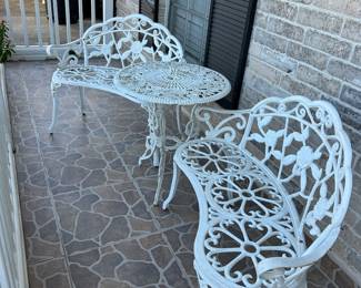 Several sets of decorative iron patio furniture
