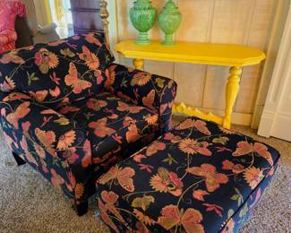 Floral butterfly upholstered accent chair and ottoman.
