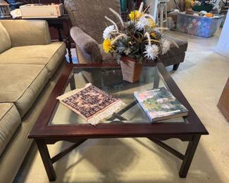 $75 Coffee table square with glass top. 
