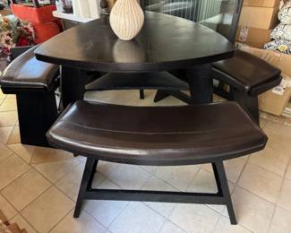 $600 - Triangle -  dark brown almost high top black table 54" with 3 benches -  