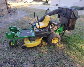 The John Deere Z235 is an entry-level, popular zero-turn mower known for its maneuverability, V-twin engine (often Briggs & Stratton or Kawasaki), and 42-inch deck with bagger & trailer - NEW BATTERY - Running - SILENTS BIDS ONLY - BIDS closing Monday 1/27 at Noon - Bids start @ $1,000