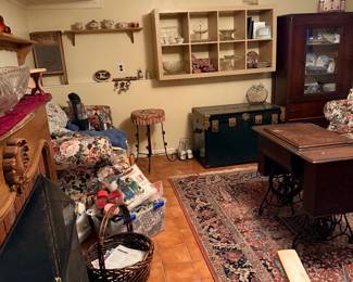 Antique chest, fireplace, couch/sofa, craft items, porcelain, china, antique radio.