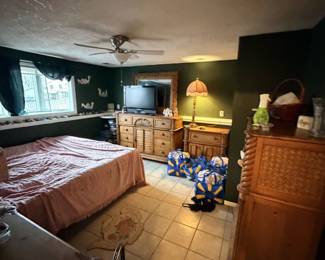 Bedroom set, TV, linens.