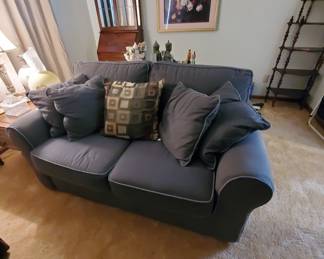 Matching pair of sofa and loveseat (pictured). They are in a seldom used living room and are in excellent condition.
