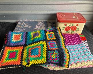 Vintage blankets and Christmas poinsettia tin