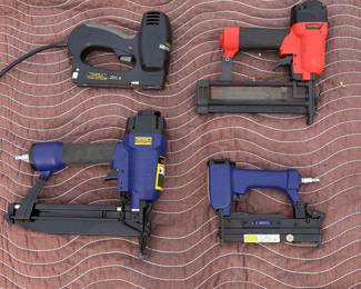 Pneumatic staple guns