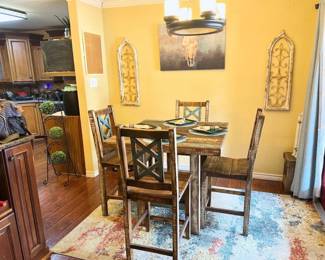 counter height rustic table and four chairs