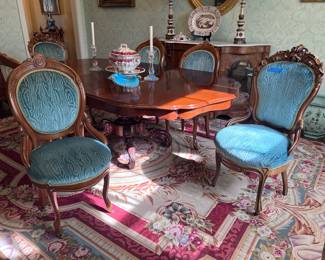 Carved pedestal dining table, needlepoint rug 