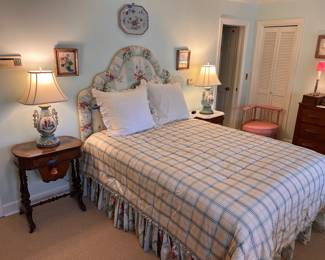 Queen bed with linens, pair of lamps, sewing table, porcelain
