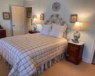 Victorian side table with marble top, Queen bed with linens, pair of lamps, porcelain