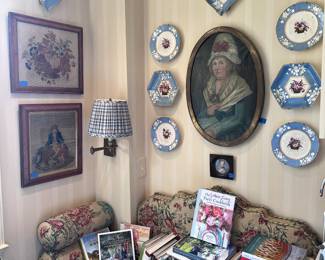 Framed needlepoints, oil painting, porcelain, cookbooks 