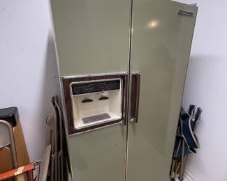 Vintage, retro 1970s era refrigerator in beautiful avocado green