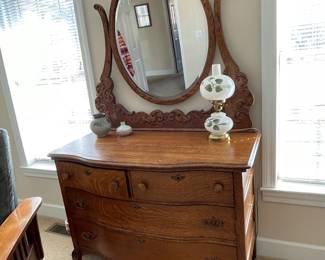 antique bow front oak dresser w/ bevelled mirror