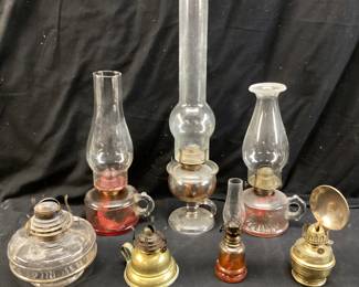 (7) VTG. ASSORTED SIZE BRASS & GLASS FINGER OIL LAMPS, NO SHIPPING PICKUP ONLY
