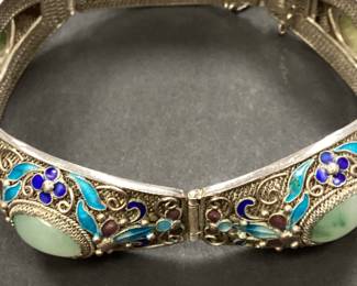 VTG CUSTOM SILVER JADE AND ENAMEL BRACELET THIS HANDCRAFTED SILVER BRACELET FEATURES 5 GORGEOUS CABOCHON JADE STONES WITH INTRICATE ENAMEL DECORATION AND DETAIL. WEIGHT IS 37.3 GRAMS