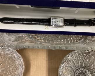 CHOICE LOT OFF TABLE, VTG. CUT TO CLEAR GLASSWARE, ANTIQUE CUTTING BOARD, LAZY SUSAN, VTG. BOTTLES, MENS WATCH, SILVERPLATE FLATWARE, STONEWARE POTTERY TABLE LAMPS