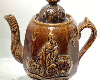 ANTIQUE BENNINGTON GLAZED POTTERY TEAPOT REBEKAH AT THE WALL TEAPOT WITH LID. THE LID DOES HAVE SOME CHIPS UNDERNEATH