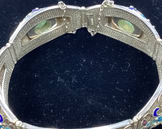 VTG CUSTOM SILVER JADE AND ENAMEL BRACELET THIS HANDCRAFTED SILVER BRACELET FEATURES 5 GORGEOUS CABOCHON JADE STONES WITH INTRICATE ENAMEL DECORATION AND DETAIL. WEIGHT IS 37.3 GRAMS