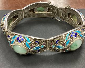 VTG CUSTOM SILVER JADE AND ENAMEL BRACELET THIS HANDCRAFTED SILVER BRACELET FEATURES 5 GORGEOUS CABOCHON JADE STONES WITH INTRICATE ENAMEL DECORATION AND DETAIL. WEIGHT IS 37.3 GRAMS
