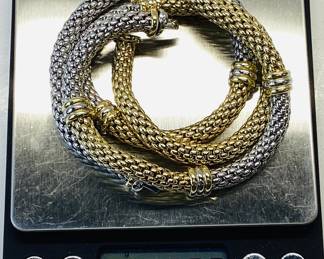 FOPE 18K TWO TONE CHAIN AND BRACELET 103.35 GRAMS MADE BY FOPE IN VINCENZA ITALY FROM THEIR PRIMA LINE. THIS ELEGANT FLEX’IT 18K WHITE AND YELLOW GOLD CHAIN AND BRACELET MAKES A BOLD STATEMENT ANY WHERE IN THE WORLD. THE CHAIN IS 17 3/4 INCHES WEIGHING 65.7 GRAMS AND BRACELET IS 8 1/4 INCHES WEIGHING 37.6 GRAMS. THESE PIECES CAN BE COMBINE AS AN EXTRA EXTRAVAGANT CHAIN OR AS TWO HEAD TURNING PIECES JEWELRY.