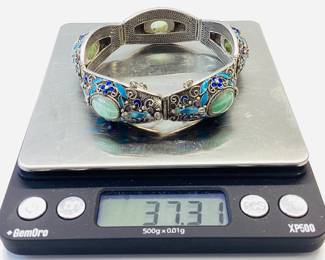 VTG CUSTOM SILVER JADE AND ENAMEL BRACELET THIS HANDCRAFTED SILVER BRACELET FEATURES 5 GORGEOUS CABOCHON JADE STONES WITH INTRICATE ENAMEL DECORATION AND DETAIL. WEIGHT IS 37.3 GRAMS