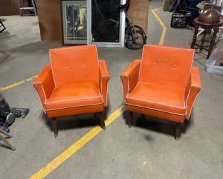 MCM atomic orange chairs