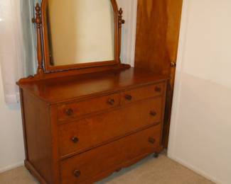 It is a very handsome dresser, and mirror combination