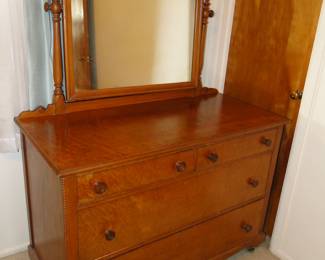 Birdseye Maple dresser with matching mirror and plenty of storage.