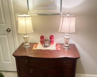 Modern art print and antique lowboy dresser