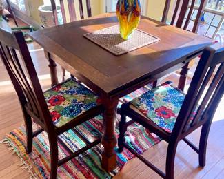 Antique slide-out extension kitchen table and 4 antique project chairs (need cushions and recovering)