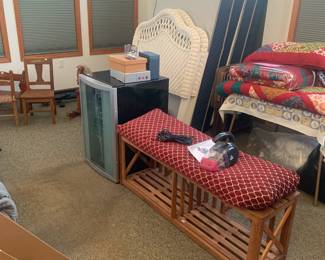 Wine Fridge, Bench, Twin Quilts, Twin Beds.