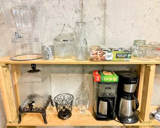 Lots of serving, kitchen, baking and cookware including Mikasa, Wilton, KitchenAid, Cuisinart, Arthur Court, Lodge, and much more!