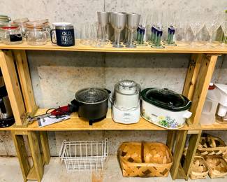 Lots of serving, kitchen, baking and cookware including Mikasa, Wilton, KitchenAid, Cuisinart, Arthur Court, Lodge, and much more!